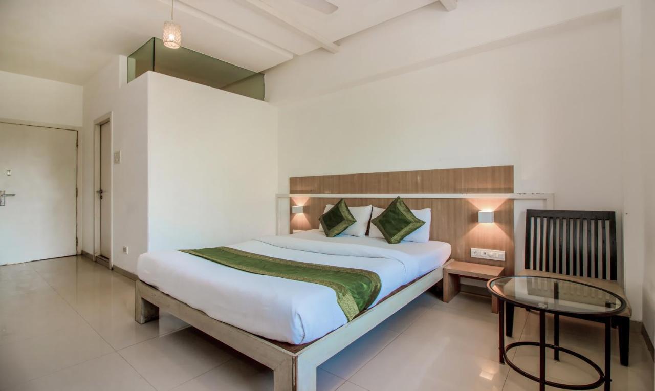 Treebo Trend Golden Nest Hotel Тане Екстериор снимка