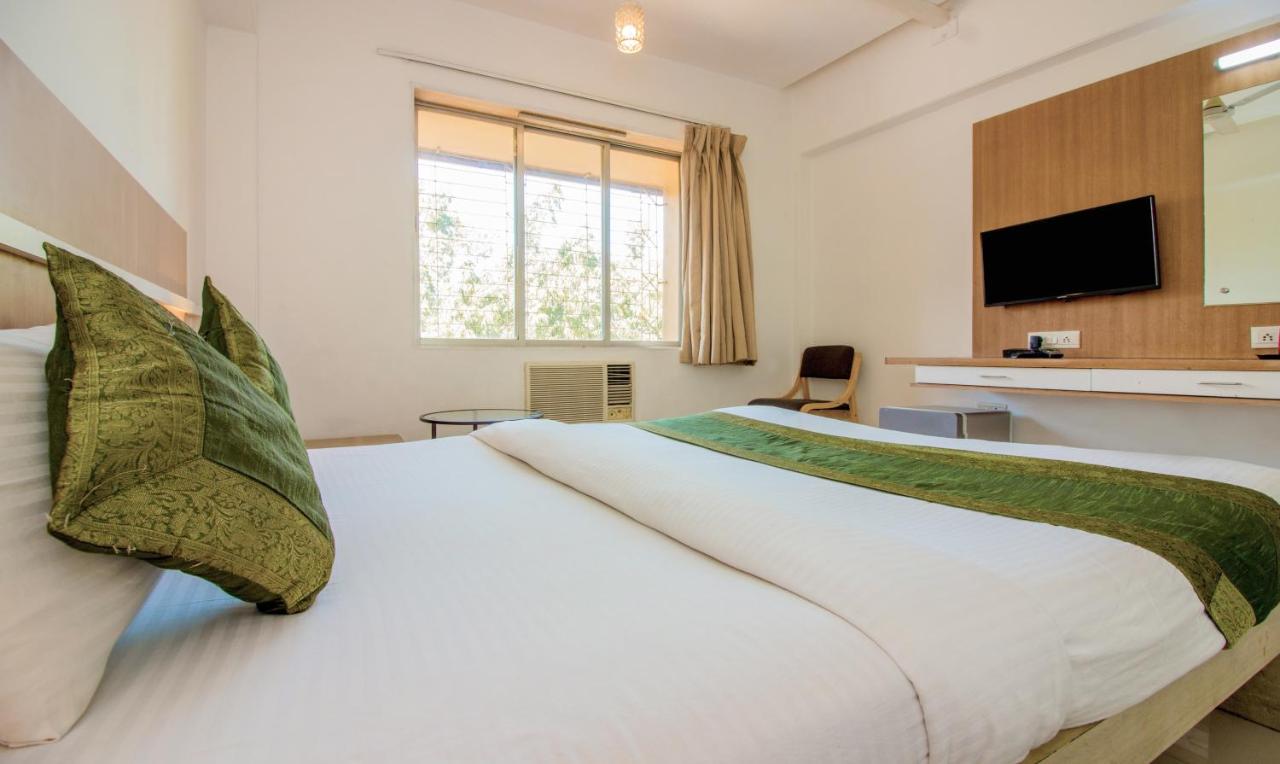 Treebo Trend Golden Nest Hotel Тане Екстериор снимка
